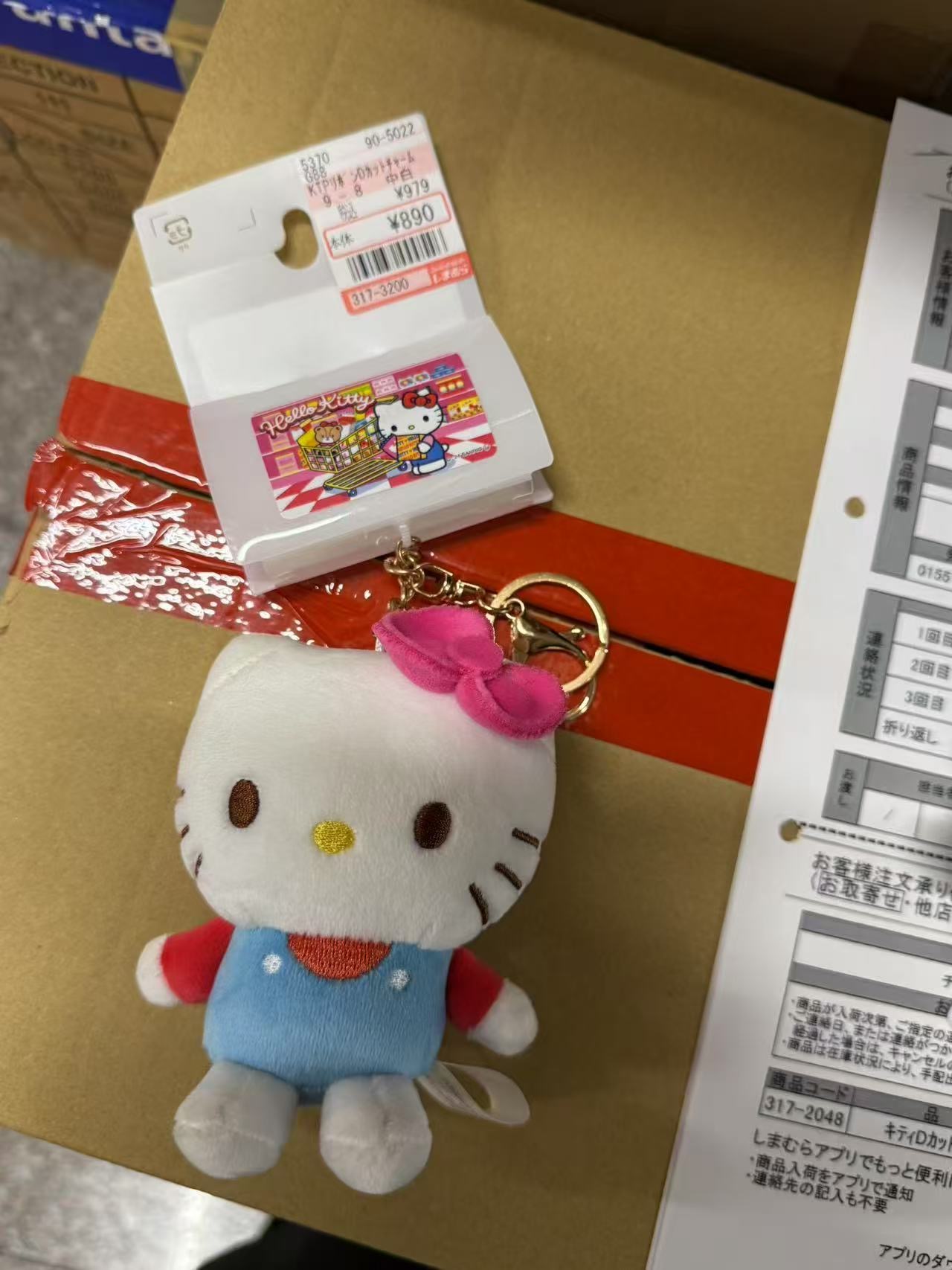 蓝色背心粉蝴蝶结Kt挂件