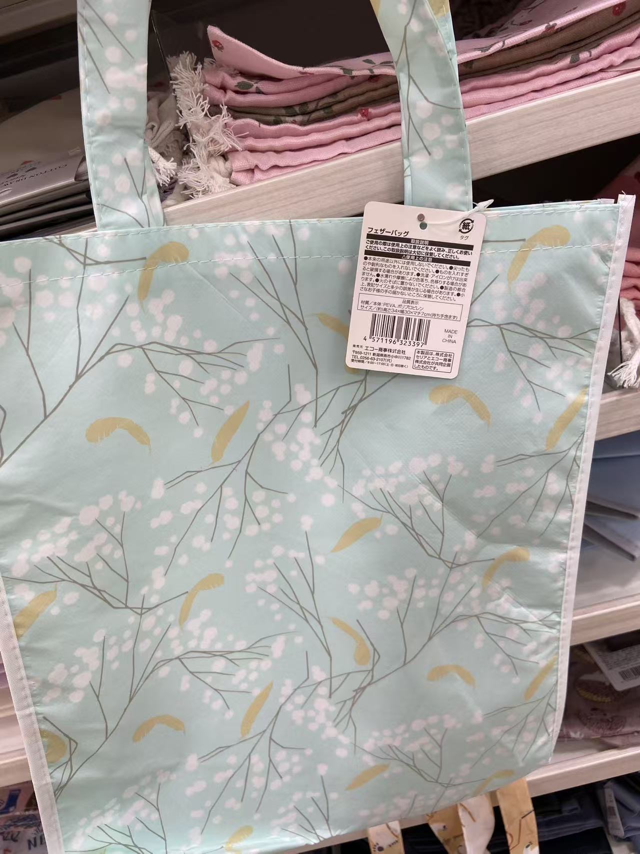 绿色底 黄白色花朵 手提袋