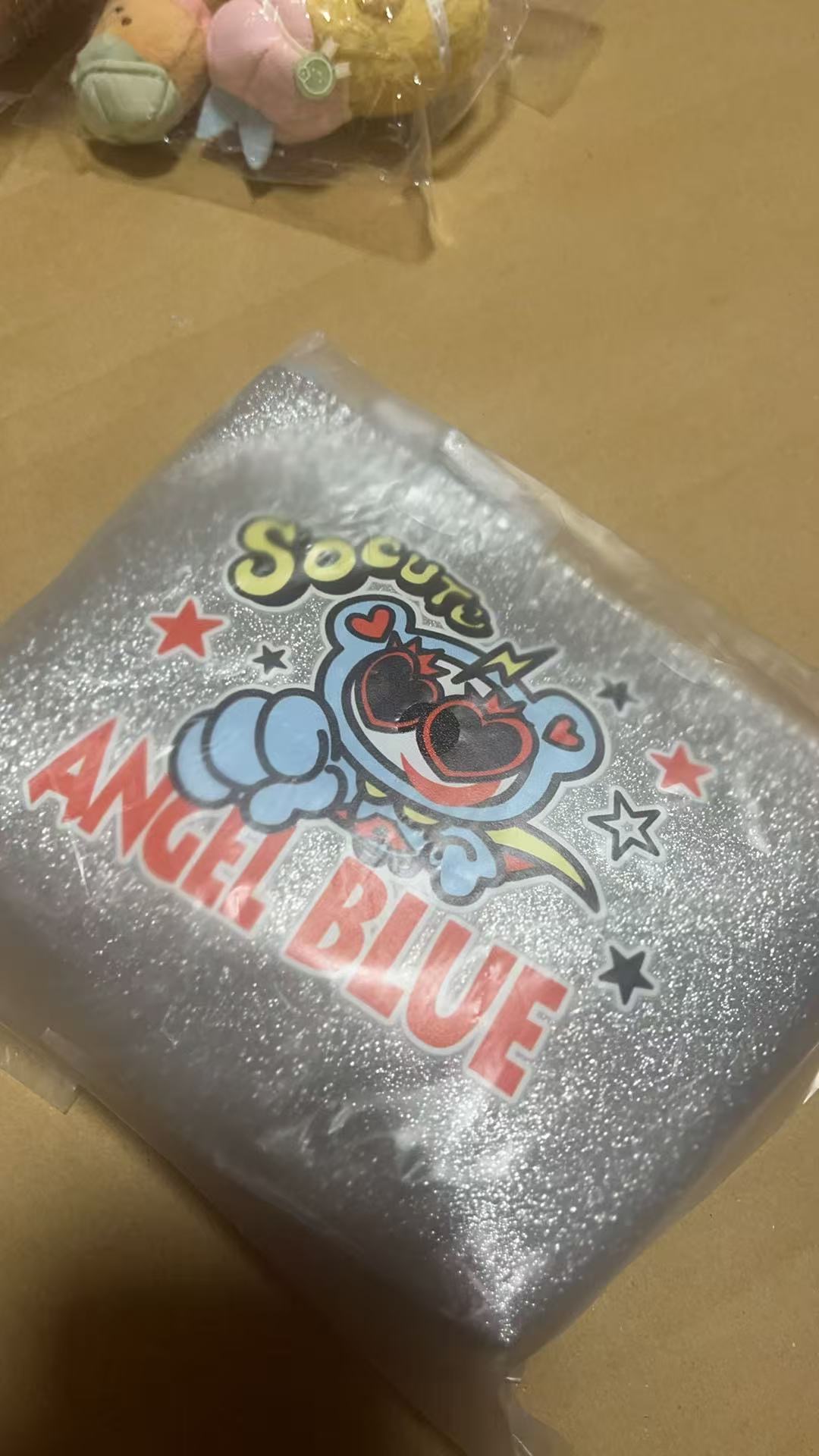 0727 ANGEL BIUE蓝猴子图案银色手包收纳包