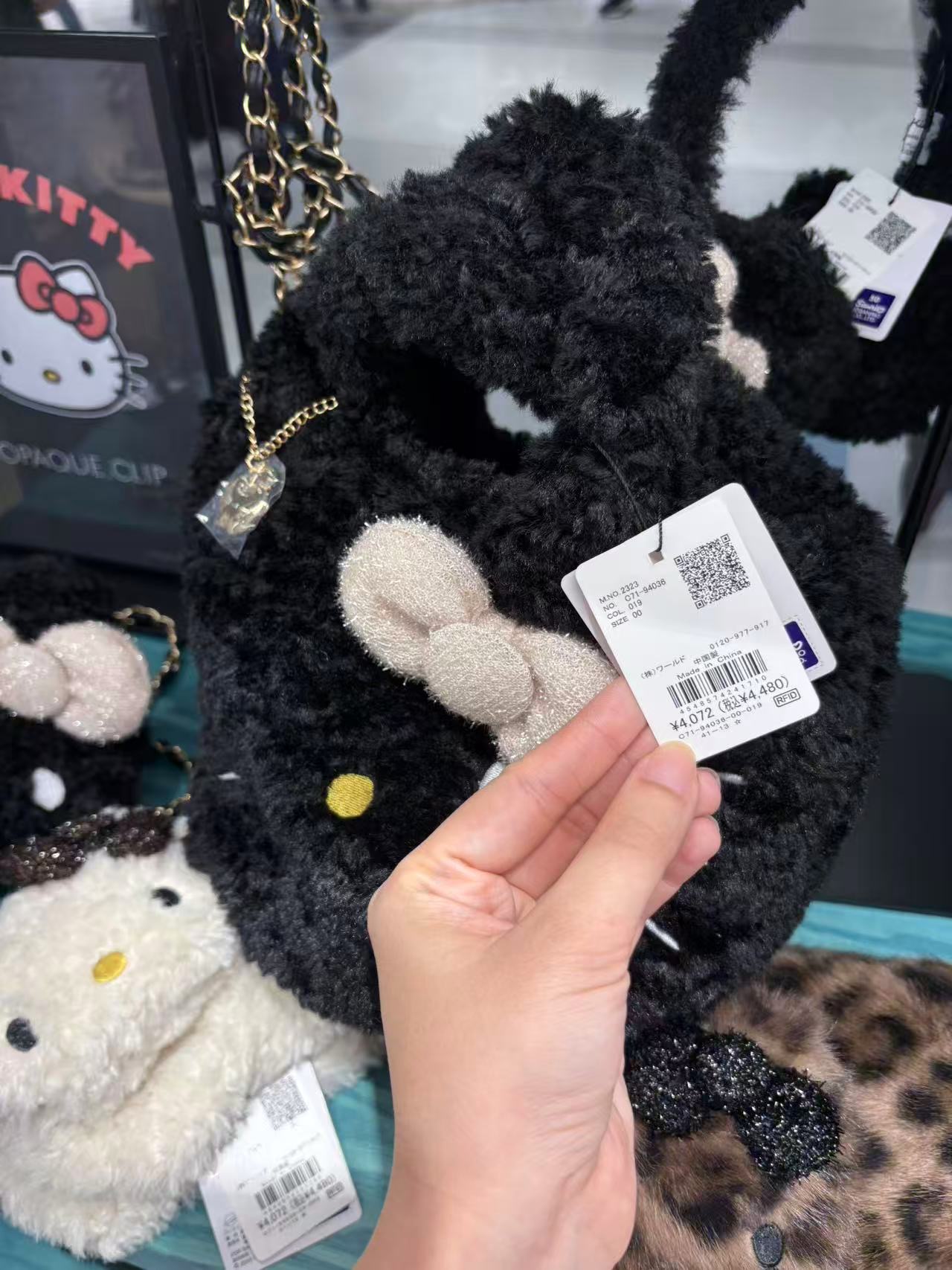 1012 三丽鸥 kt 白色蝴蝶结黑色 手拿包