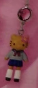 1029 三丽欧长腿 深蓝短裙棕黄kt 小挂件 以图片为准