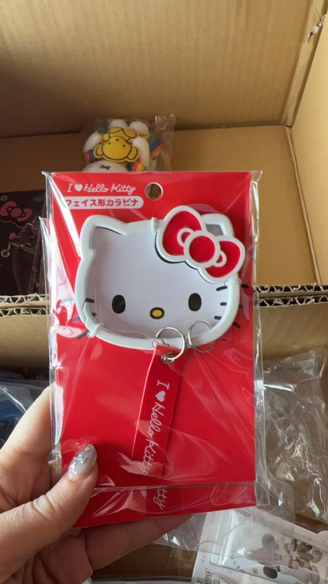 1207 三丽欧白色KT镂空大头 钥匙扣