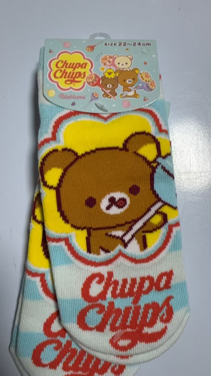 0114 折扣店 轻松熊 熊哥棒棒糖蓝白纹袜子23-25cm