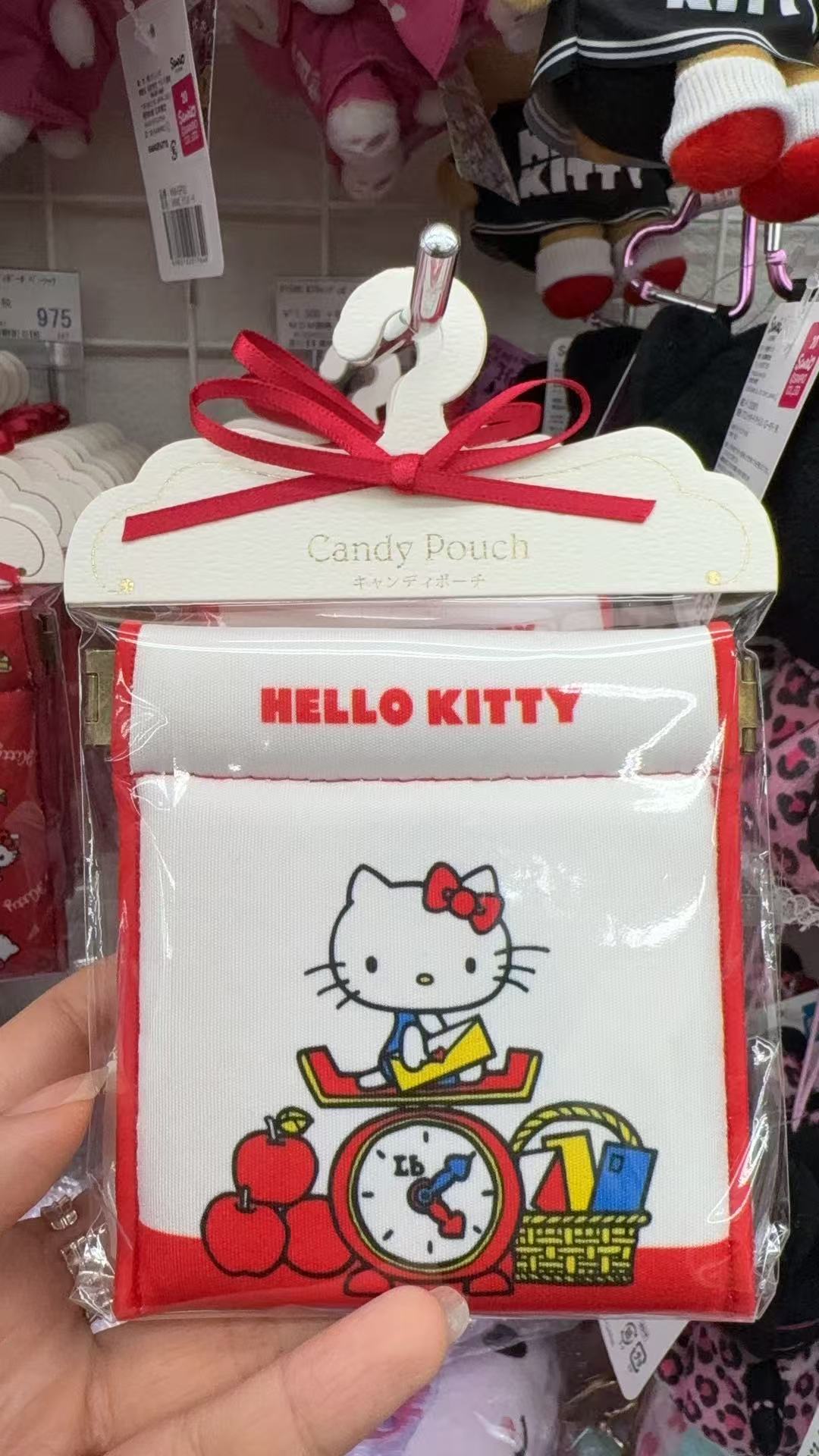 0130 折扣店三丽鸥  Kitty时钟图案 白色红边糖果袋