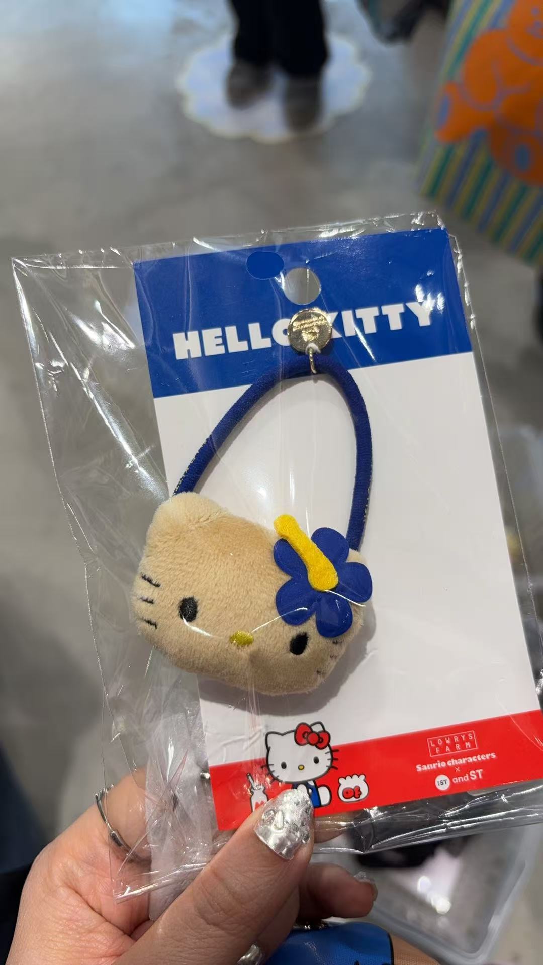 0218 三丽鸥 黄皮kitty大头蓝色花朵 蓝色头绳