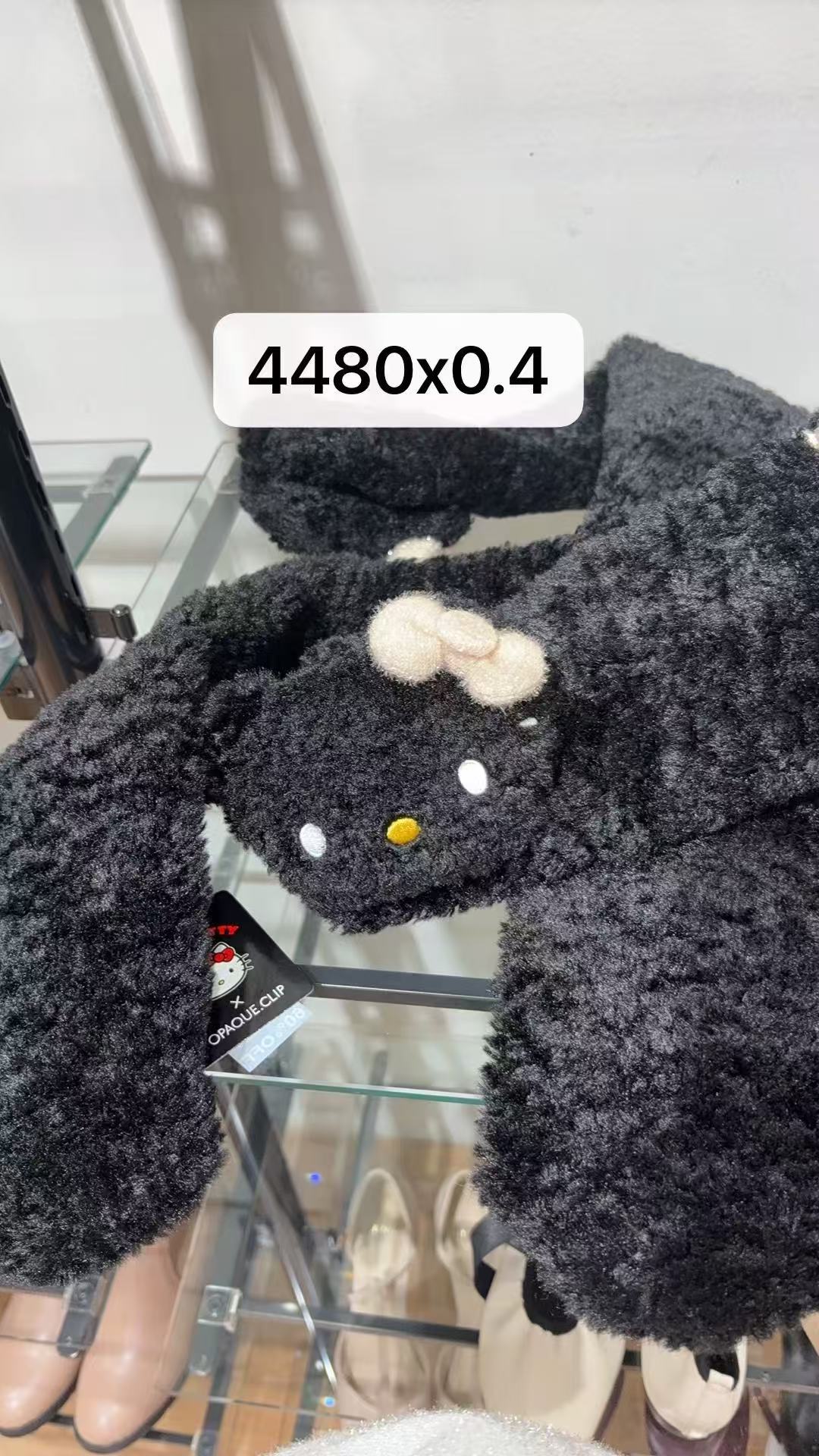 0302 三丽欧黑色kt围巾 4折