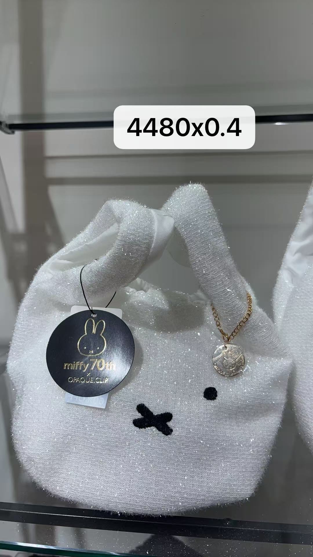 0302 米菲白色手提包4折