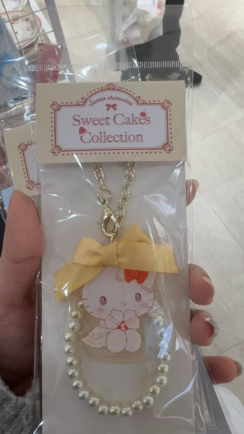 0303 三丽鸥 草莓蛋糕系列kt黄色蝴蝶结挂件 5汇