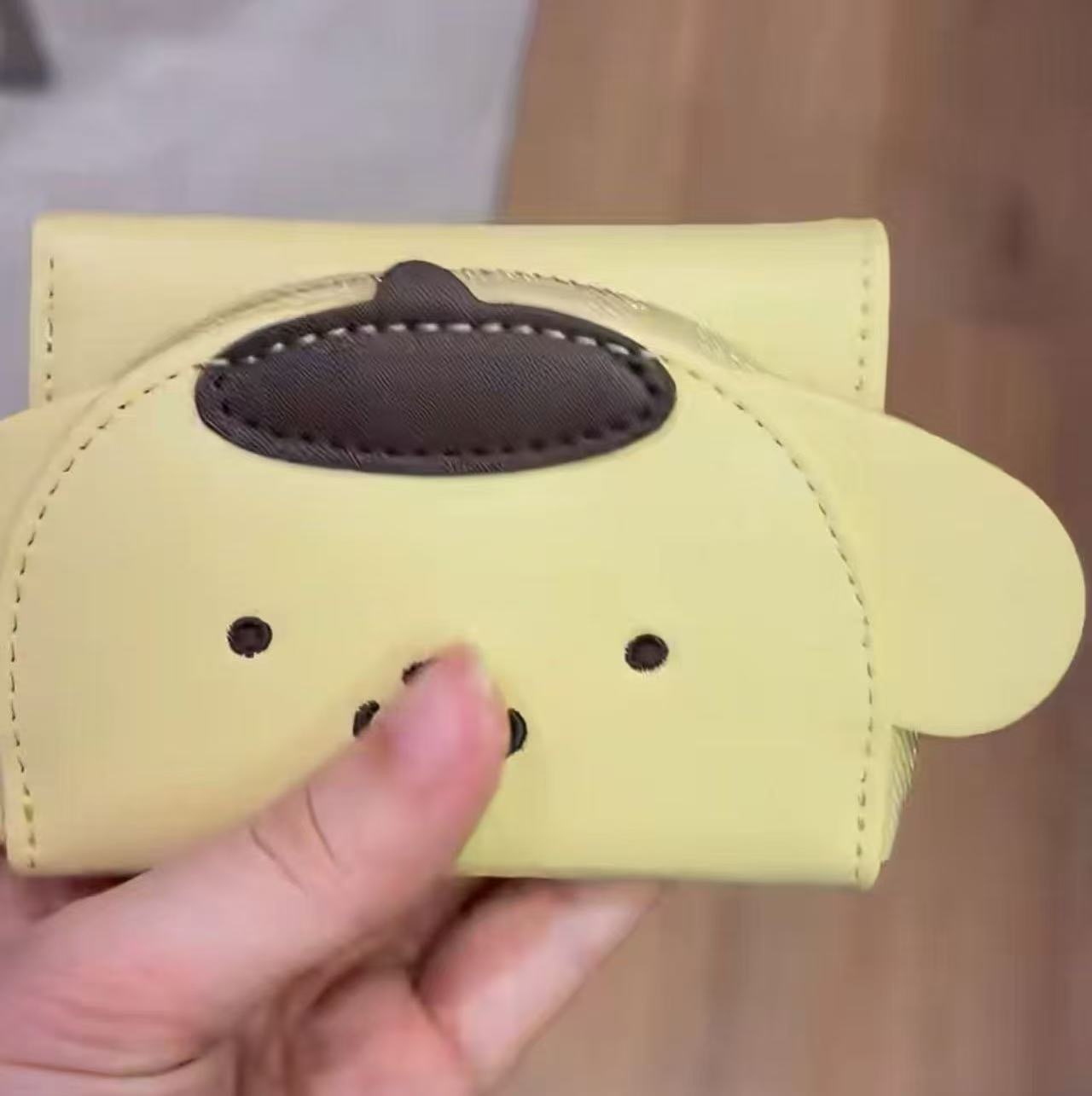 0302 三丽欧布丁狗黄色 收纳包