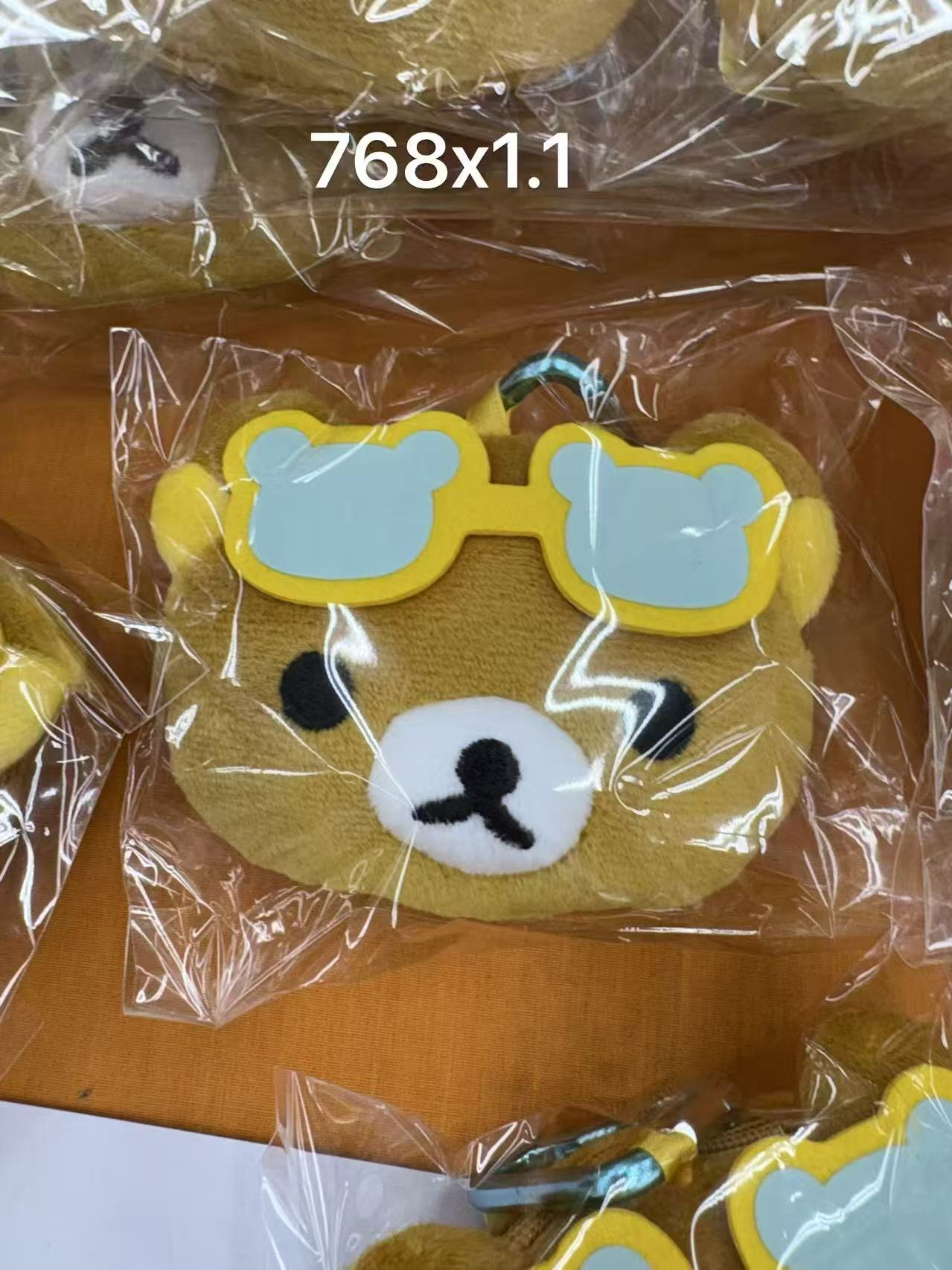 0306 折扣店 轻松熊熊哥耳机包 