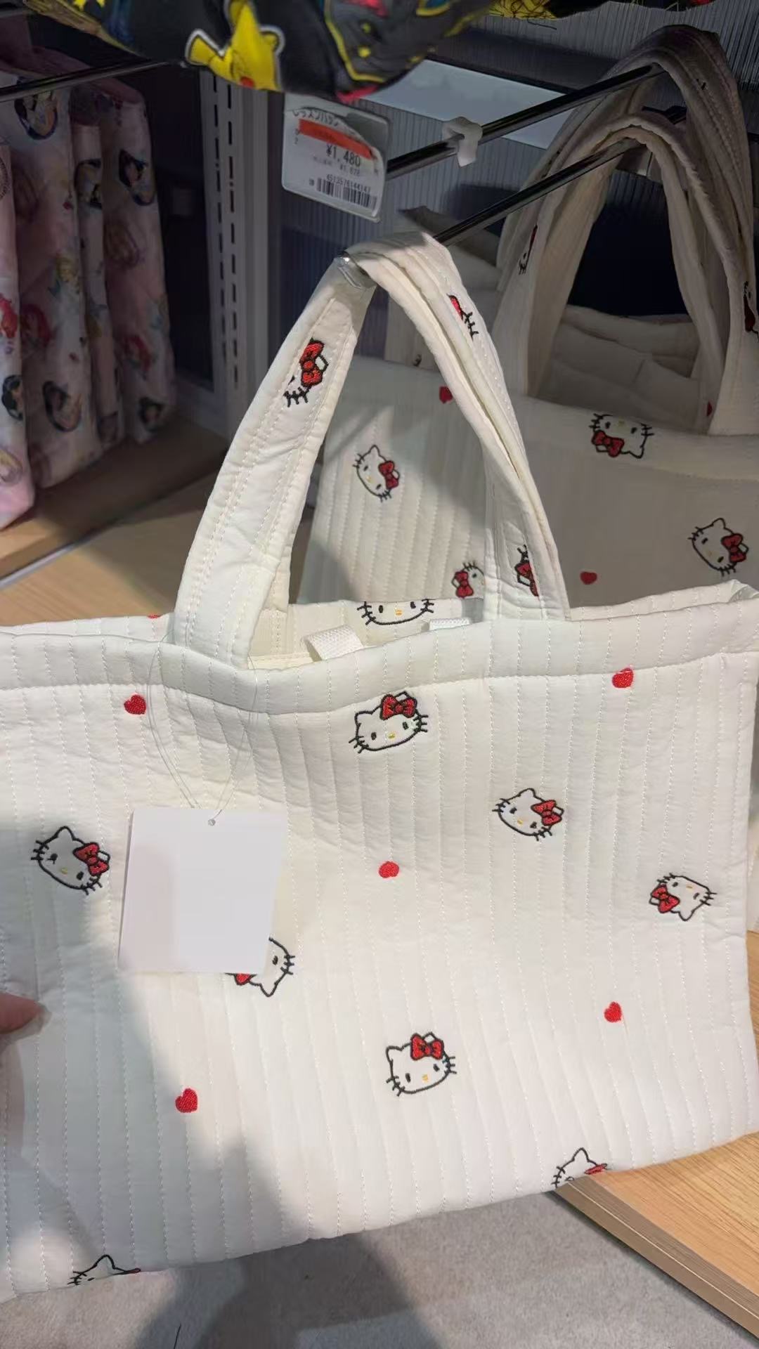 0322 白色刺绣 kt图案 手提包 5汇