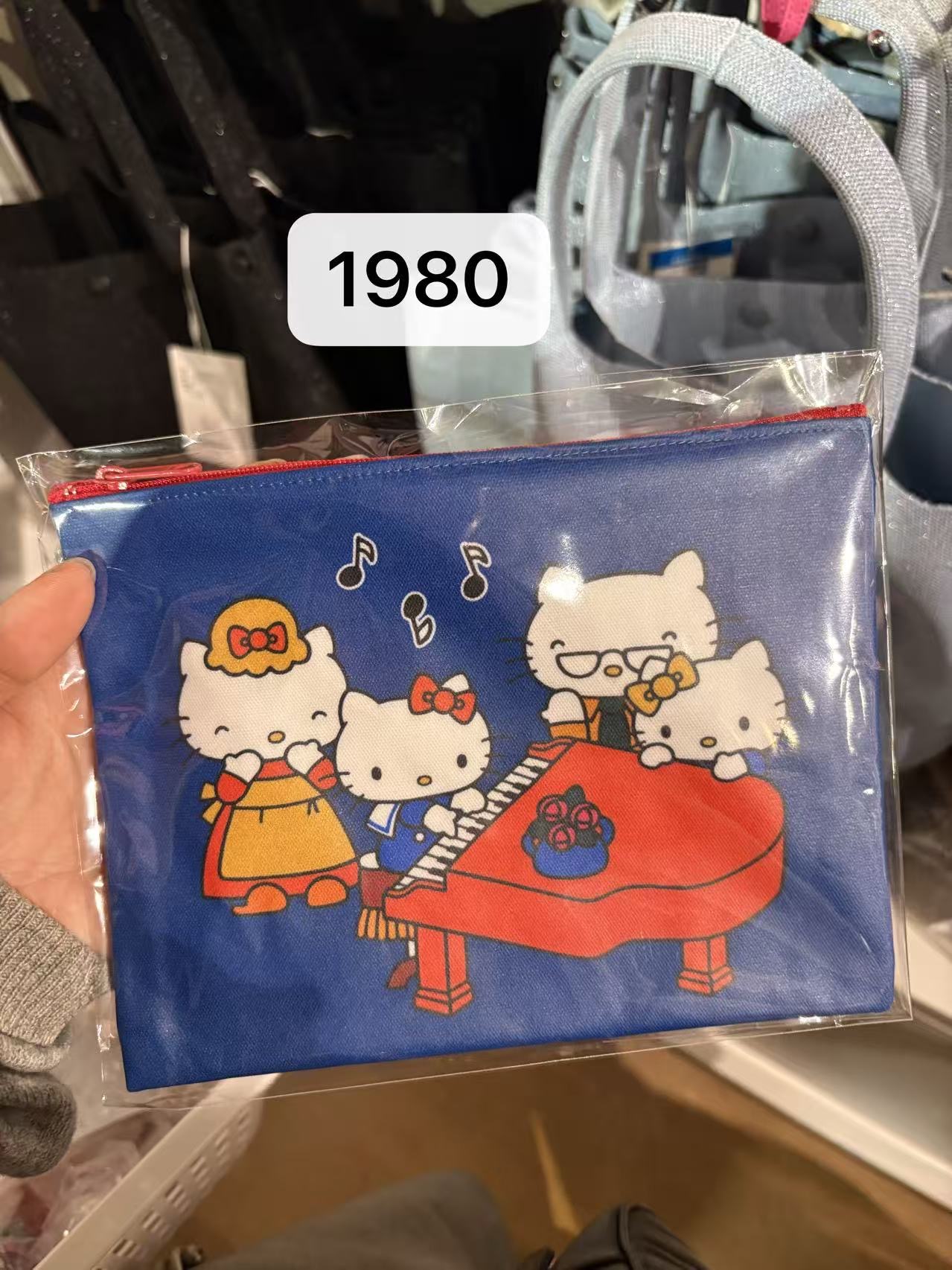 0409  Hello Kitty 家族音乐会主题拉链收纳袋