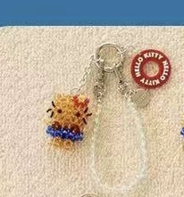 5汇0501 三丽鸥 黑皮kt红色泳圈珠子钥匙扣挂件