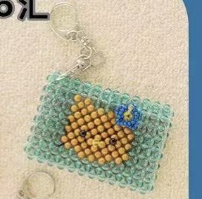 5汇0501 三丽鸥 黑皮kt绿色小珠包挂件