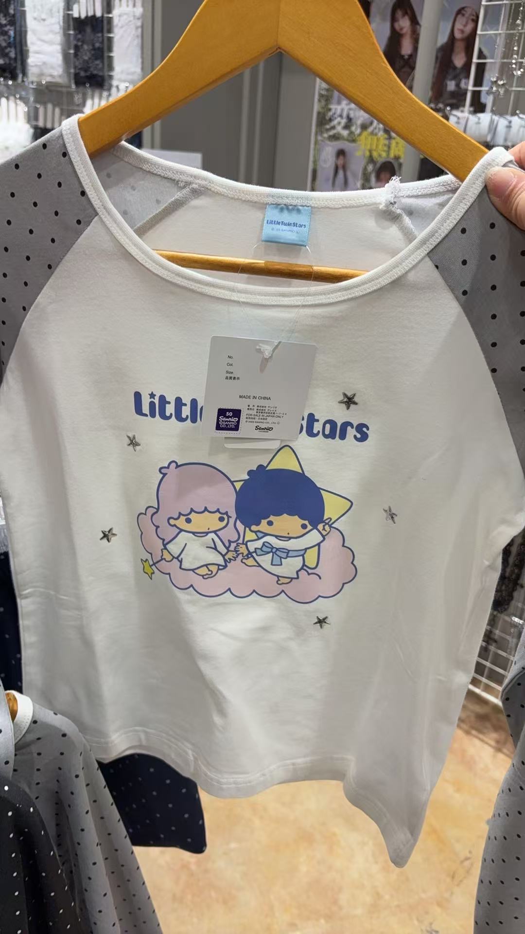 0412 三丽欧双子星插肩上衣 