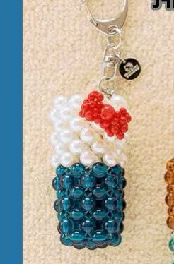 0501 5汇 三丽欧百强白色kt墨绿色拼接 钥匙扣