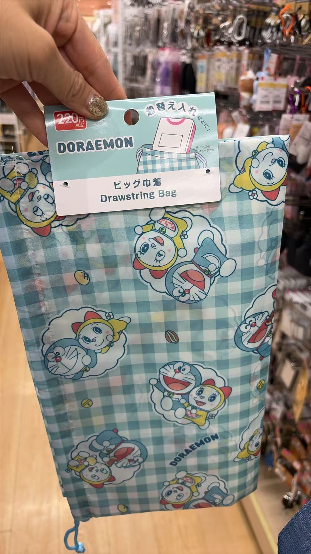 0616 百元店 蓝色格子叮当猫收纳袋