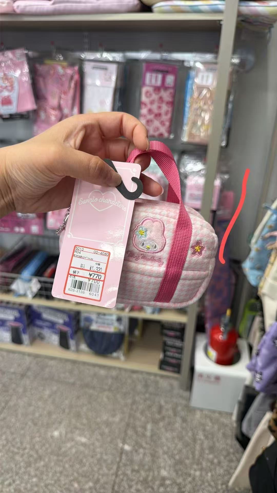 0617 美乐蒂格纹衍缝手提收纳小包