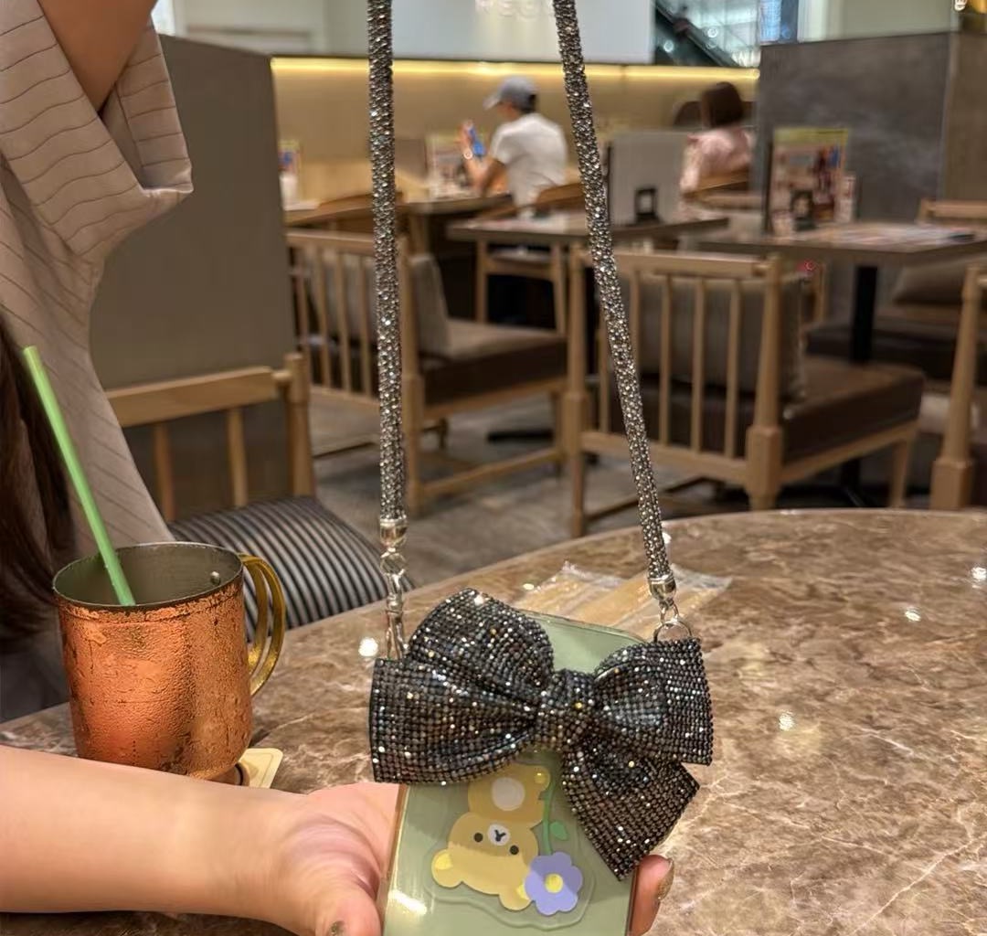 0618 打折 黑色亮闪闪蝴蝶结手机链 