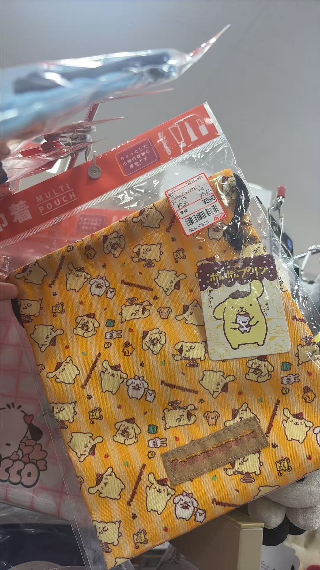 0918 三丽欧 布丁狗橘色飞耳 束口袋 